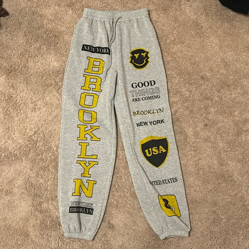 Grey Sweatpants with Yellow Designs